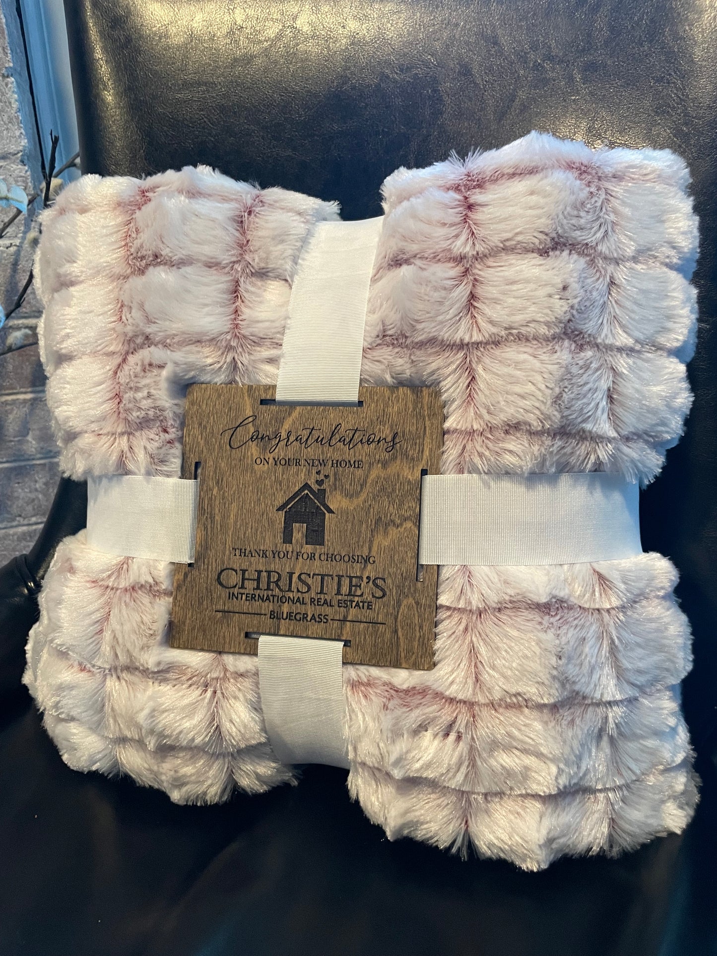 Cozy blanket with custom engraved tag
